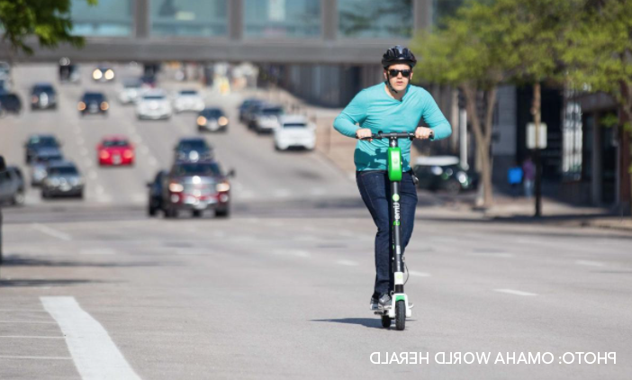 Man on Scooter, Photo by Omaha World Herald